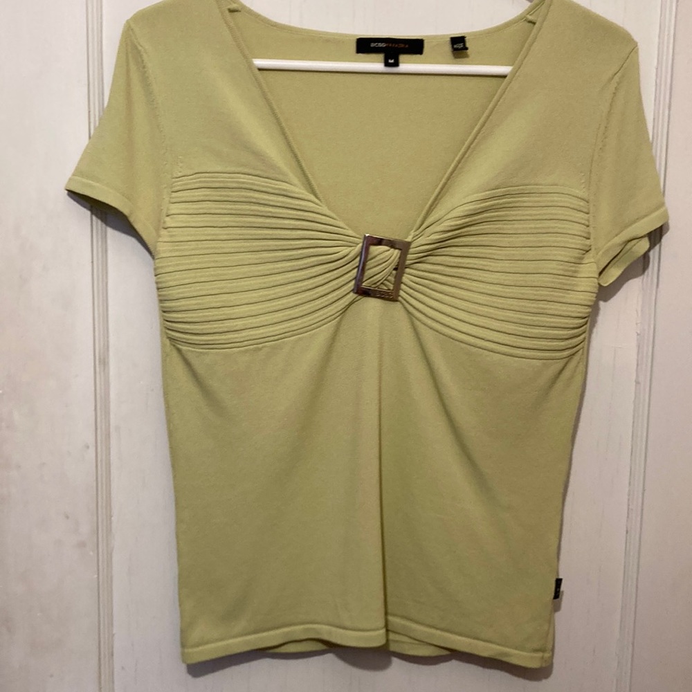 Welcome spring with this lightweight sweater; pair it with a skirt or jeans.